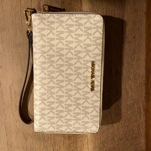 Michael kors travel wristlet.